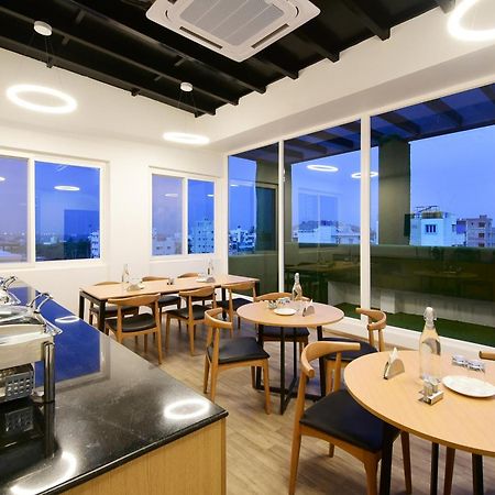 Townhouse Airport Road Hotel Yelahanka Bagian luar foto